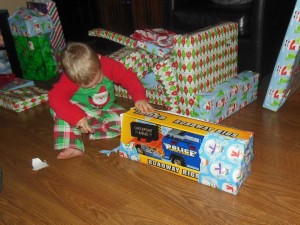 One of Travis' nephews opening our gift.